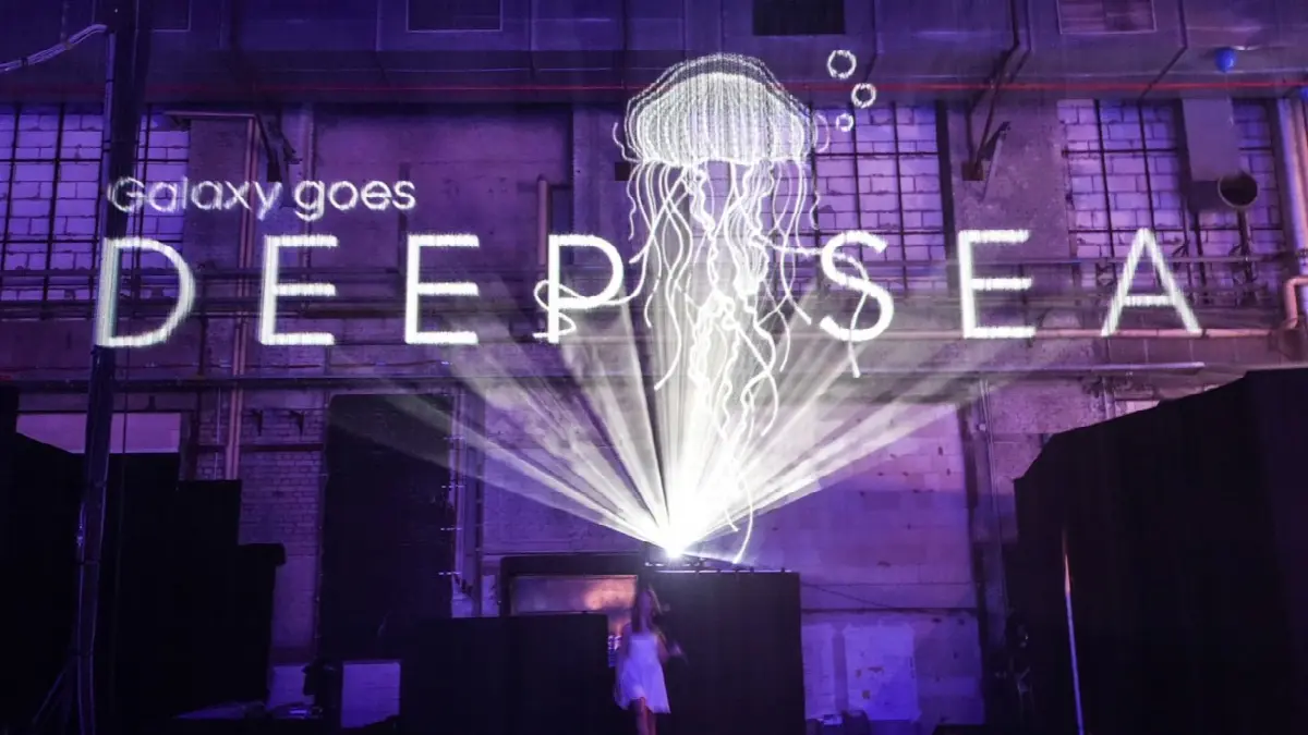 Immersive Projection: Galaxy goes DEEP SEA with jellyfish, deep-sea colors, and human participation.
